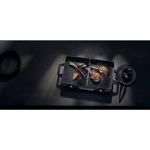 Découvrez notre test détaillé du grill électrique WMF : puissance 2400W, surface XL et performances en cuisine. Avis, avantages et inconvénients.